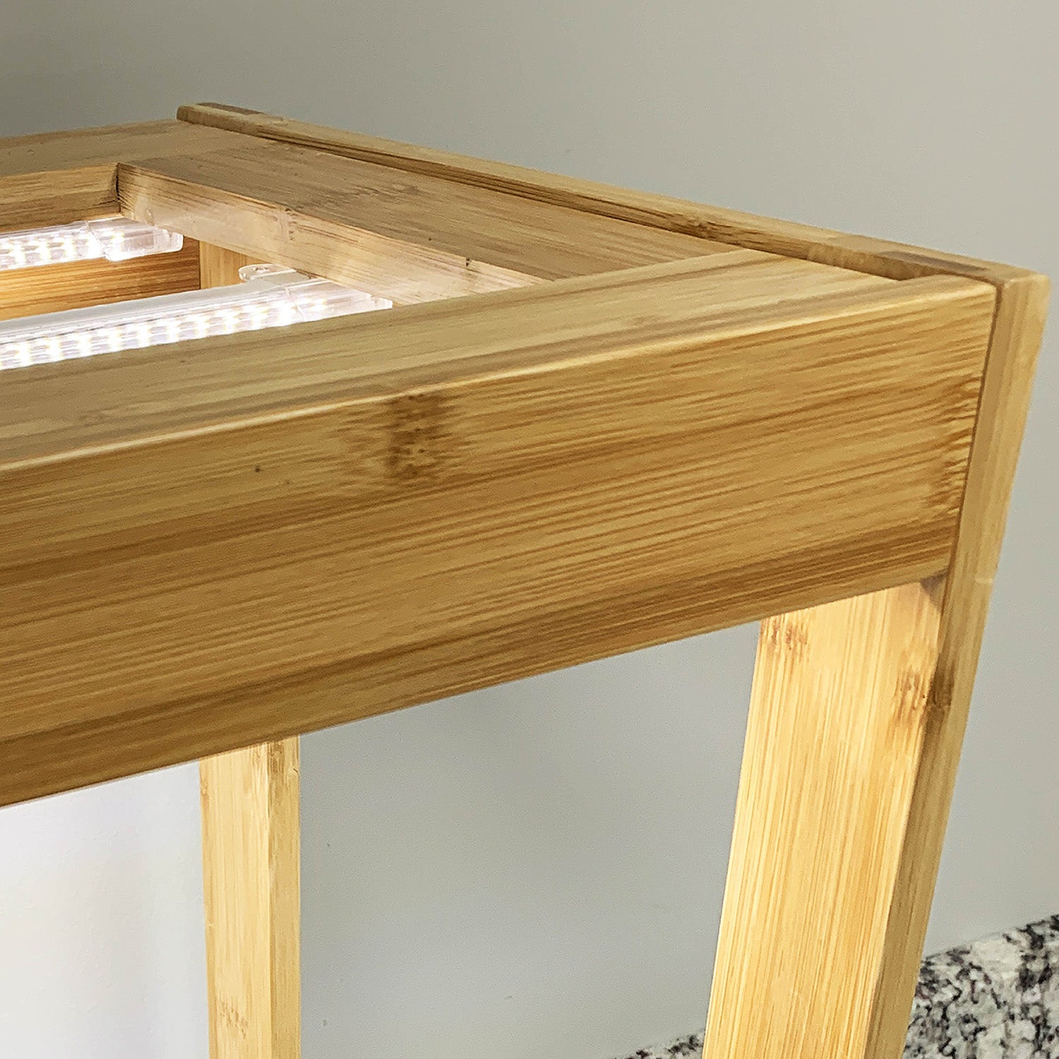 A bamboo indoor growhouse with LED lights